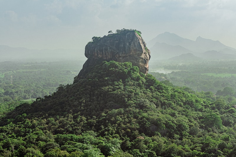 Ancient frescoes of the Sigiriya Maidens painted on the rock wall