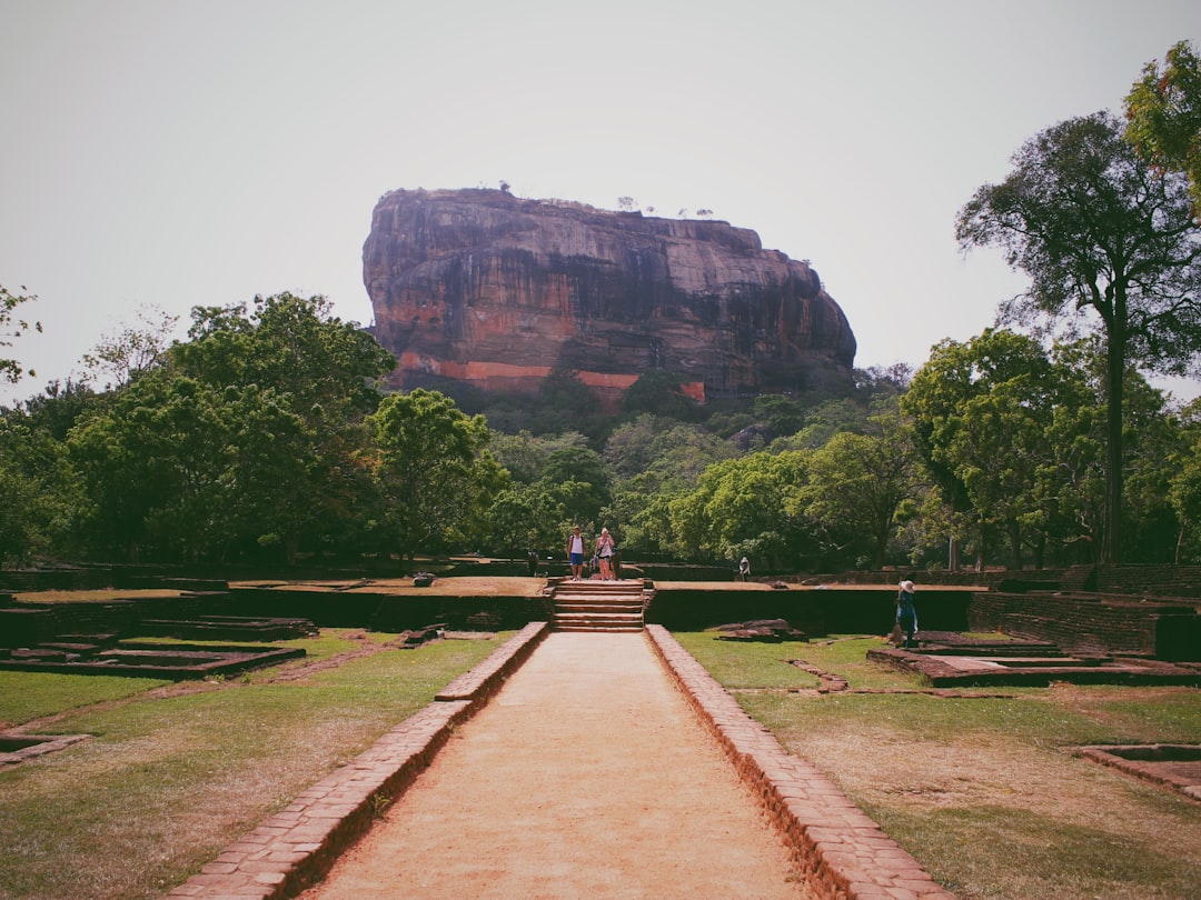 Sigiriya fortress surrounded by lush green forest